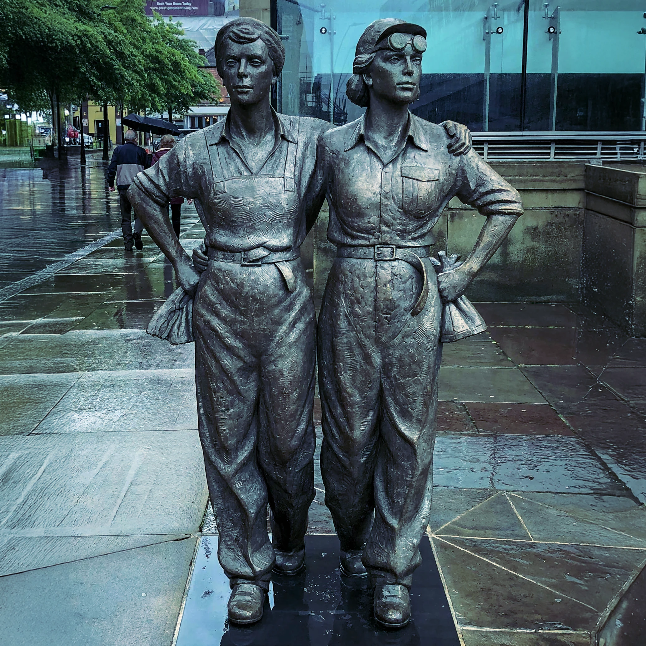 A statue of two women workers.